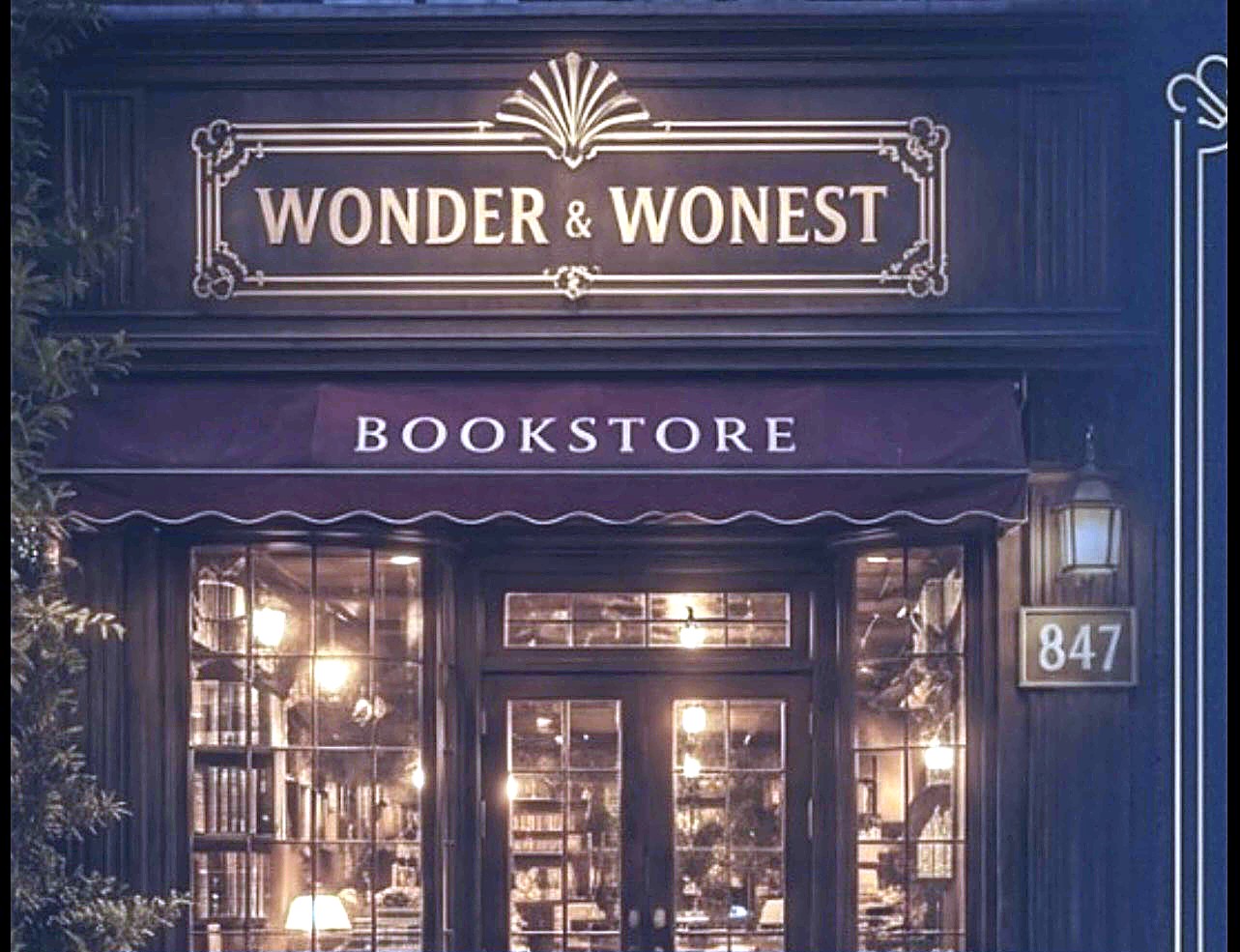 The Wonder & Wonest bookstore at night, number 847, windows lit